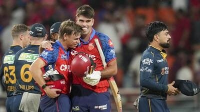 Punjab Kings' Cooper Connolly, front left, and Xavier Bartlett celebrate after winning against Gujarat Titans. (PTI)