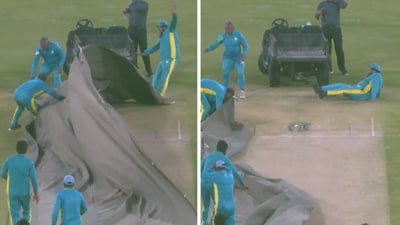 A groundsman at the Gaddafi Stadium in Lahore falls over after a big gust of wind. (Screengrab)