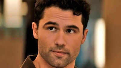 Robbie G.K., who captivates audiences as Kip Grady in Netflix's 'Heated Rivalry,' has voiced his hopes for greater exploration of his character's bond with Scott Hunter in future installments. Expressing his delight at the show's warm reception from fans, he described it as 'incredible.' Additionally, Robbie reminisced about his artistic upbringing, noting similarities to his talented co-star Connor Storrie. Robbie G.K. from ‘Heated Rivalry’ says he has hopes for Scott and Kip’s storyline: 'A whole lot could be explored'