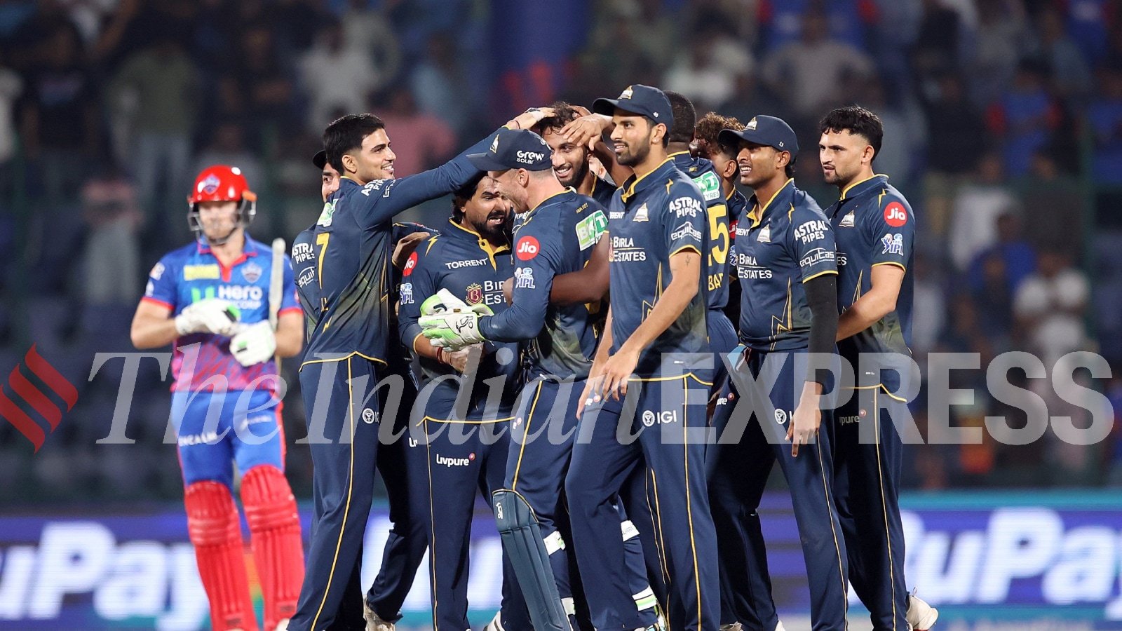 Gujarat Titans team celebrates after winning the match against Delhi Capitals at Arun Jaitley Stadium in New Delhi on Wednesday. (EXPRESS PHOTO BY PRAVEEN KHANNA)
