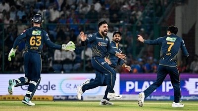 Rashid Khan and teammates celebrate the wicket of Sameer Rizvi. (Rahul Singh) Rashid Khan and teammates celebrate the wicket of Sameer Rizvi. (Rahul Singh)