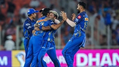 Mumbai Indians' Jasprit Bumrah and teammates celebrate the wicket of Gujarat Titans' Sai Sudharsan. (ANI Pic Service)