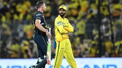 Jos Buttler (L) speaks with Chennai Super Kings' captain Ruturaj Gaikwad at the end of the 2026 IPL match against Gujarat Titans (AFP)