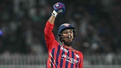 Mukul Choudhary celebrates after getting the winning runs against KKR for LSG. (AFP)