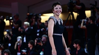 Maggie Gyllenhaal on the red carpet of the 80th Venice Film Festival on September 8, 2023 at Venice Lido. (Photo by GABRIEL BOUYS / AFP) (AFP)