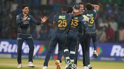 Gujarat Titans celebrate after they won against Delhi Capitals in New Delhi on Wednesday. (AP)