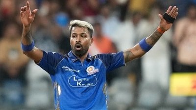 Mumbai Indians' captain Hardik Pandya reacts after a deliver during the IPL match against Royal Challengers Bengaluru (AP)
