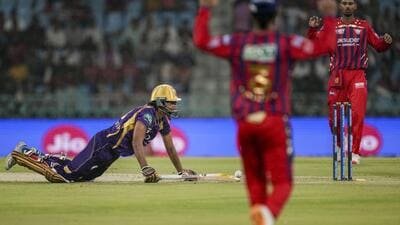 Kolkata Knight Riders’ Angkrish Raghuvanshi dives to reach the crease against Lucknow Super Giants. (PTI)