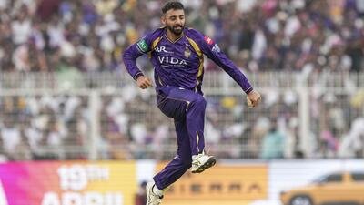 Kolkata Knight Riders spinner Varun Chakravarthy celebrates after dismissing Rajasthan Royals captain Riyan Parag in the IPL game at the Eden Gardens on Sunday. (PTI)
