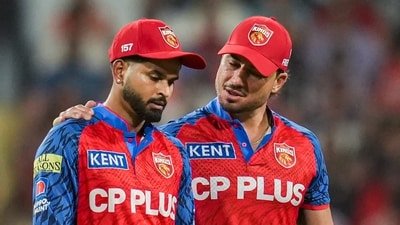 Punjab Kings' captain Shreyas Iyer, left, has a word with Marcus Stoinis (PTI) Punjab Kings' captain Shreyas Iyer, left, has a word with Marcus Stoinis (PTI)