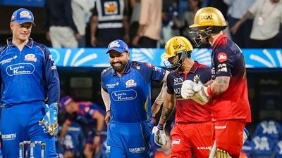 Rohit Sharma and Virat Kohli in action during the MI vs RCB game. (PTI)