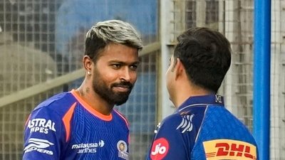 Hardik Pandya interacts with team owner, manager Akash Ambani. (PTI)