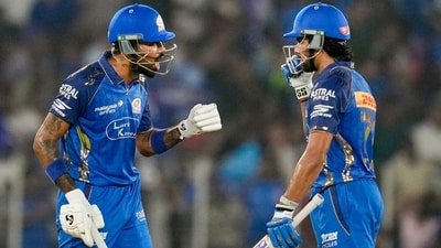 Hardik Pandya and Tilak Varma during the IPL 2026 match between GT and MI. (PTI)