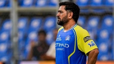 MS Dhoni with a robotic camera dog during a practice session ahead of the IPL 2026 match between Mumbai Indians and Chennai Super Kings (PTI)