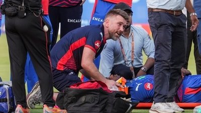Lungi Ngidi being attended to after facing an injury during the IPL 2026 match between DC and PBKS. (PTI)
