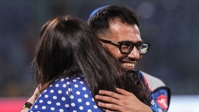 Punjab Kings' Yuzvendra Chahal, back, and the team's co-owner Preity Zinta celebrate after the team won the IPL match against Delhi Capitals (PTI)