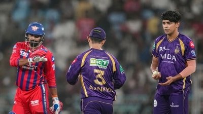 KKR captain Ajinkya Rahane, centre, and Kartik Tyagi, right, interact after a No Ball during the IPL 2026 match against Lucknow Super Giants (PTI)