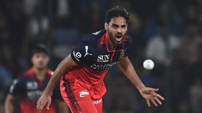 Bhuvneshwar Kumar leads the IPL Purple Cap race with 14 wickets. (Hindustan Times)