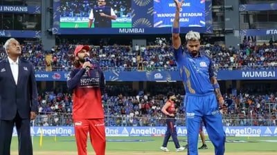 Mumbai Indians and RCB players are wearing black armbands (BCCI) Mumbai Indians and RCB players are wearing black armbands (BCCI)