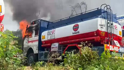 Smoke plumes into the air as a fire broke out in an oil tanker in Narwal, Jammu (ANI photo) Several oil tankers catch fire in Jammu, 2 gutted