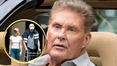 David Hasselhoff, 73, steps out with a walker with his wife, Hayley Roberts, during recovery phase