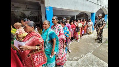 Voters queue up as they wait to cast their votes during the second phase of the West Bengal Assembly elections 2026 at a polling station, in Howrah on Wednesday. (ANI Photo) SIR divides families across Kolkata: Chosen few celebrate vote as lakhs mourn deletion