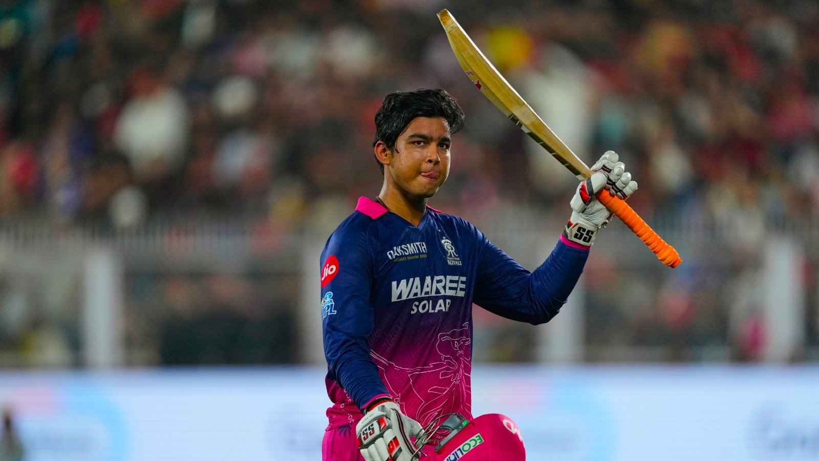 Rajasthan Royals' Vaibhav Sooryavanshi waves his bat as he leaves the ground after losing his wicket during the Indian Premier League cricket match between Royal Challengers Bengaluru and Rajasthan Royals in Guwahati, India, Friday, April 10, 2026. (AP Photo)