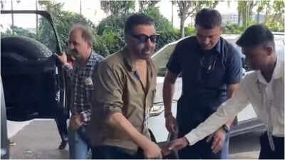Sunny Deol and wife Pooja Deol made a rare joint appearance at Mumbai airport on Tuesday, with visuals going viral instantly. Sunny's gentlemanly gesture of letting Pooja walk ahead won hearts online. The intensely private couple was last seen together publicly at son Karan Deol's wedding a few years ago. Sunny Deol spotted with wife Pooja Deol at Mumbai airport in RARE public appearance - video