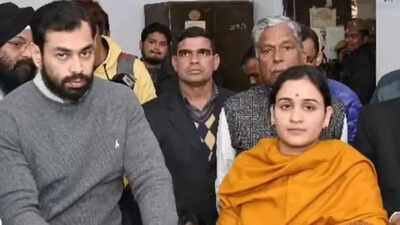 <p>Prateek Yadav with Aparna Yadav (Image/PTI)<br></p> Blood clot in lungs caused Prateek Yadav’s death, reveals post-mortem report