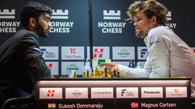 Magnus Carlsen vs D Gukesh (Photo by Michal Walusza/Norway Chess) 'You're not a teenager anymore': Magnus Carlsen's birthday wish for World Chess Champion D Gukesh goes viral - Watch