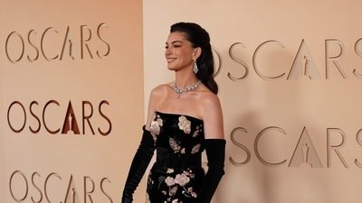 Anne Hathaway arrives at the Oscars on Sunday. (Gregory Bull/Invision/AP)