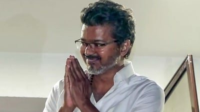 Tamilaga Vettri Kazhagam (TVK) President Vijay greets the crowd from his father's residence as his party leads during vote counting for the Tamil Nadu assembly elections, in Chennai on Monday. (ANI Video Grab) (ANI Video Grab)