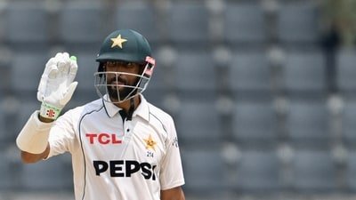 Pakistan's captain Shan Masood celebrates after scoring a half-century (50 runs) during the fourth day of the second Test cricket match between Bangladesh and Pakistan (AFP)