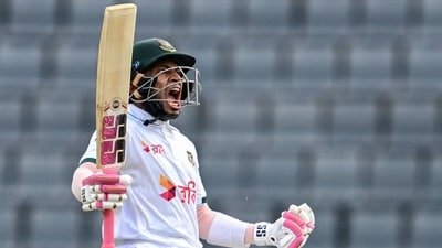 Bangladesh's Mushfiqur Rahim celebrates after scoring a century (100 runs) during the third day of the second Test cricket match between Bangladesh and Pakistan (AFP)