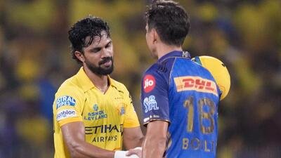 Chennai Super Kings skipper Ruturaj Gaikwad (L) being congratulated by Mumbai Indians' Trent Boult after leading his side to victory in Chennai on Saturday. (PTI)