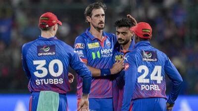 Delhi Capitals' Mitchell Starc celebrates with teammates during the match against Rajasthan Royals. (PTI)