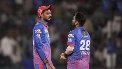 Delhi Capitals' captain Axar Patel, left, and Vipraj Nigam during an Indian Premier League match against Kolkata Knight Riders, in New Delhi. (PTI)