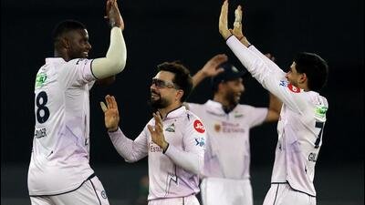 Gujarat Titans' Jason Holder celebrates after taking the wicket of Sunrisers Hyderabad's Nitish Kumar Reddy. (REUTERS)