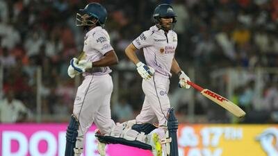 Gujarat Titans' captain Shubman Gill, right and Sai Sudharsan in action during IPL 2026. (AP)