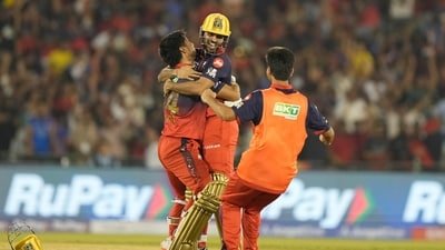 Royal Challengers Bengaluru's Rasikh Dar, left, and Bhuvneshwar Kumar celebrates after Royal Challengers Bengaluru won the match during the Indian Premier League cricket match (AP) Royal Challengers Bengaluru's Rasikh Dar, left, and Bhuvneshwar Kumar celebrates after Royal Challengers Bengaluru won the match during the Indian Premier League cricket match (AP)