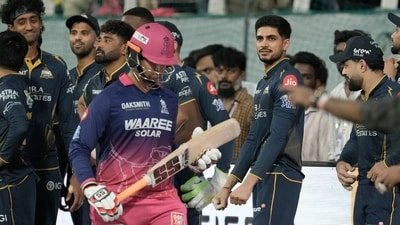 Gujarat Titans' captain Shubman Gill with teammates watches as Rajasthan Royals' Vaibhav Sooryavanshi walks in. (AP Photo/Ashwini Bhatia) Gujarat Titans' captain Shubman Gill with teammates watches as Rajasthan Royals' Vaibhav Sooryavanshi walks in. (AP Photo/Ashwini Bhatia)