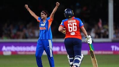 India's Nandani Sharma celebrates the wicket of England's Dani Gibson on Thursday in Chelmsford. (AP)