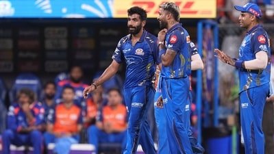 Mumbai Indians' captain Hardik Pandya, centre, Jasprit Bumrah, left, and Suryakumar Yadav during an IPL 2026 match against Sunrisers Hyderabad (PTI)