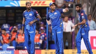 Mumbai Indians' captain Hardik Pandya, left, Jasprit Bumrah, right, and Suryakumar Yadav during a IPL 2026 game (PTI)