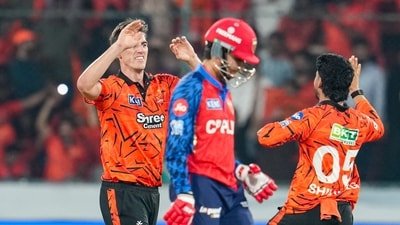 Sunrisers Hyderabad's captain Pat Cummins, left, celebrates with a teammate after taking the wicket of Punjab Kings' Priyansh Arya during an IPL 2026 match (PTI)