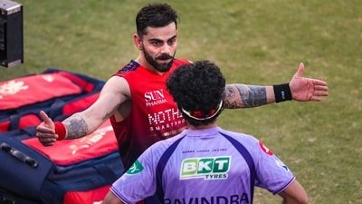 Virat Kohli and Rachin Ravindra are having a conversation! (PTI) Virat Kohli and Rachin Ravindra are having a conversation! (PTI)