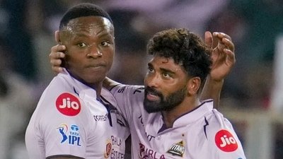 Gujarat Titans' Kagiso Rabada, left, celebrates with teammate Mohammed Siraj after taking the wicket of Sunrisers Hyderabad's Ishan Kishan during an Indian Premier League (IPL) 2026 T20 cricket match (PTI)