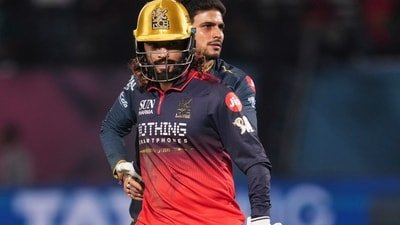 Royal Challengers Bengaluru's captain Rajat Patidar, front, with Gujarat Titans' captain Shubman Gill during the IPL 2026 first qualifier match against Gujarat Titans, (PTI)