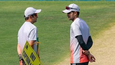 Shubman Gill with head coach Gautam Gambhir stands near the pitch during a training session. (PTI)
