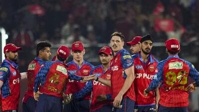Punjab Kings' Ben Dwarshuis celebrates with teammates during the match against Delhi Capitals. (PTI)